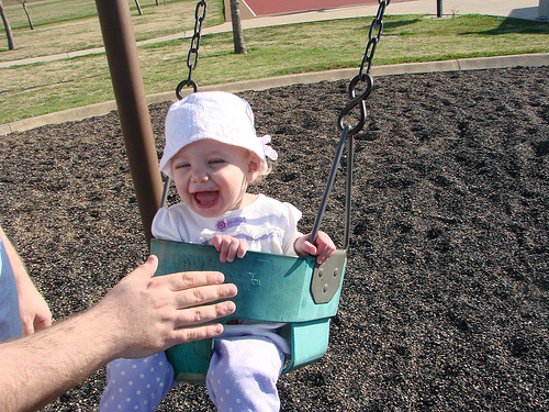 Having fun on the swing Having fun on the swing