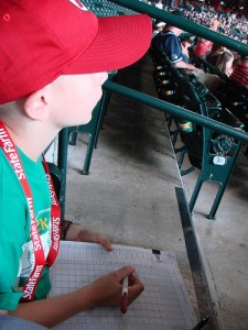 Watching the play at the plate