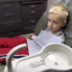 The Son in a dental chair