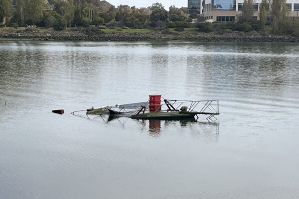 A mostly submerged boat